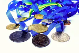 En bild föreställande medaljer i olika valörer